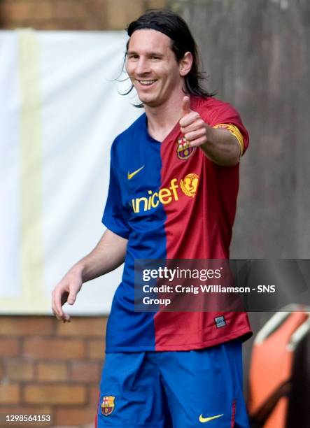 V BARCELONA.TANNADICE - DUNDEE.Lionel Messi celebrates as he bags a hat-trick for Barcelona