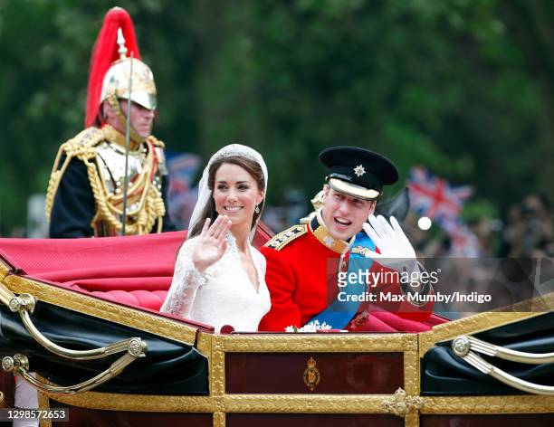 Catherine, Duchess of Cambridge and Prince William, Duke of Cambridge travel down The Mall, on route to Buckingham Palace, in the 1902 State Landau...