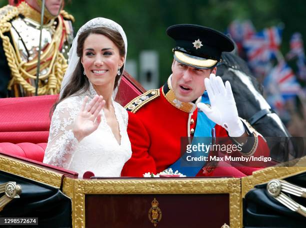 Catherine, Duchess of Cambridge and Prince William, Duke of Cambridge travel down The Mall, on route to Buckingham Palace, in the 1902 State Landau...