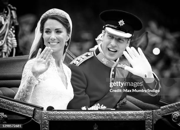 Catherine, Duchess of Cambridge and Prince William, Duke of Cambridge travel down The Mall, on route to Buckingham Palace, in the 1902 State Landau...