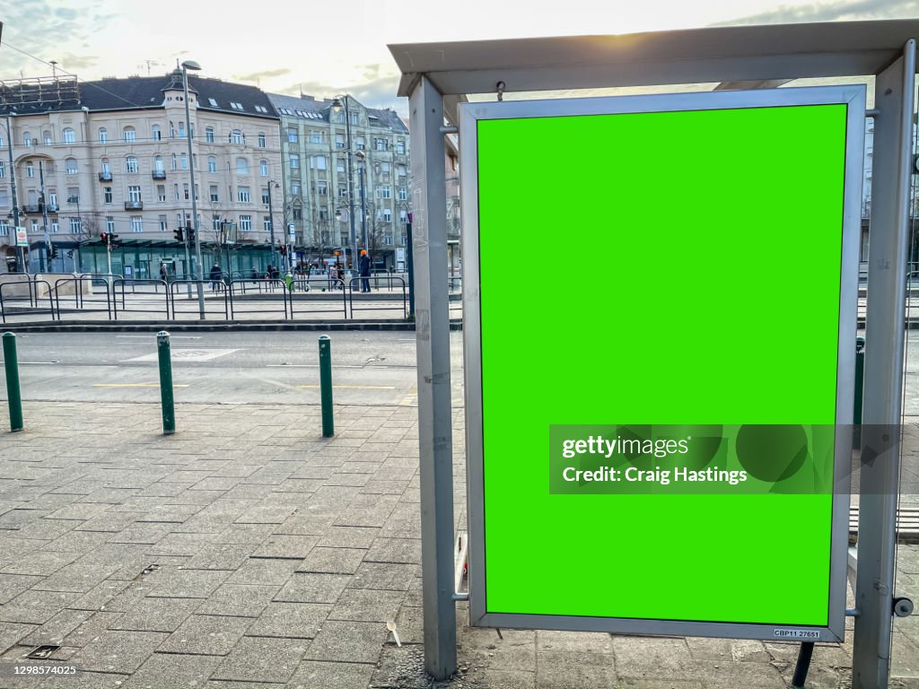 European City Centre Bus and Tram Station with Advertising Billboard Green Screen ChromaKey Copy Space