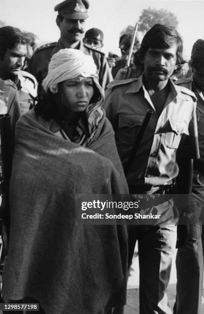 "Bandit queen" Indian rights activist, bandit and politician Phoolan Devi walks to the surrender ceremony at Bhind, Madhya Pradesh