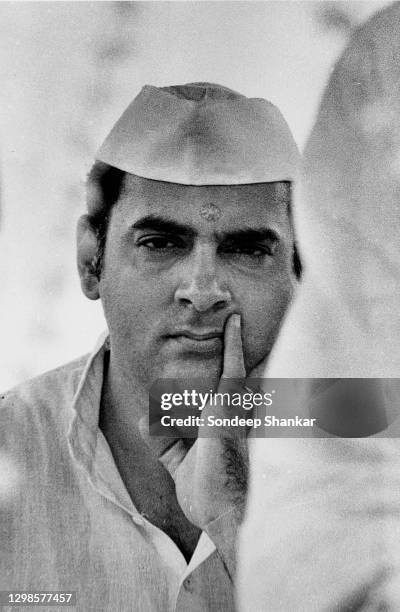 Rajiv Gandhi sitting in a pensive meed during a prayer meeting after the death of his younger brother Sanjay in a plane crash in New Delhi, June 1980.