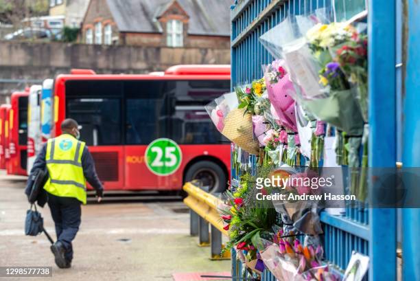 Tributes are left on the railings of Lewes Road Bus Garage in memory of bus driver Christopher Turnham who died of COVID-19 last Wednesday at the age...