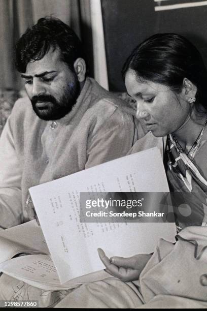 Indian politician Phoolan Devi with husband Umaid Singh address a press conference at the Press Club of India on January 14, 1995 in New Delhi,...