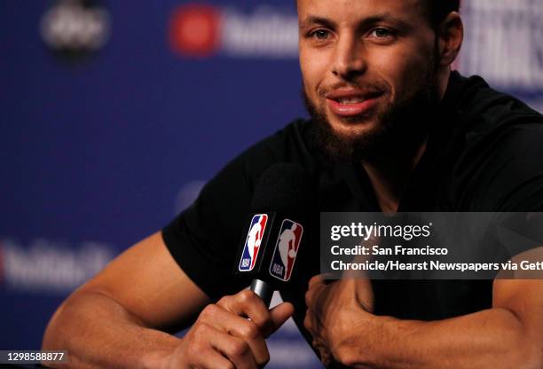 Stephen Curry answers questions from the press as the Golden State Warriors and Toronto Raptors practiced before Game 5 of the 2019 NBA Finals at...