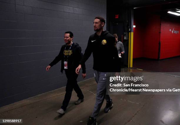 Klay Thompson makes his way to the interview room as the Golden State Warriors and Toronto Raptors practiced before Game 5 of the 2019 NBA Finals at...