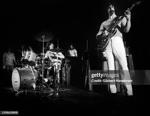 Frank Zappa performs on stage with the Mothers of invention, Amsterdam, Netherlands, 1970. Drummer Aysley Dunbar is on left.