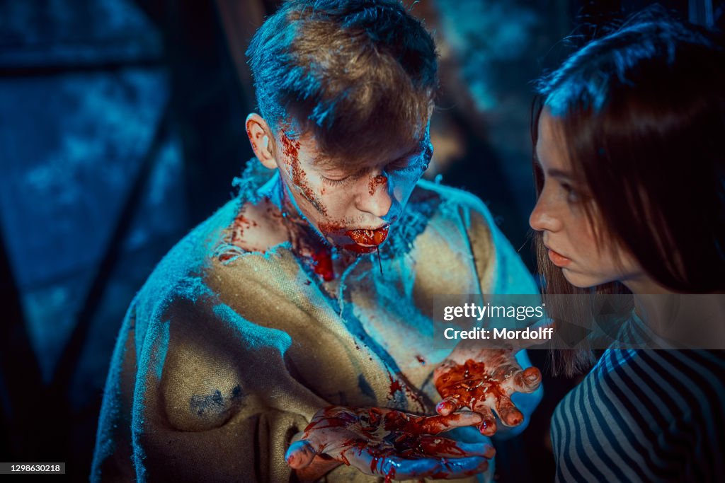 Young Man Scary Zombie And His Girlfriend