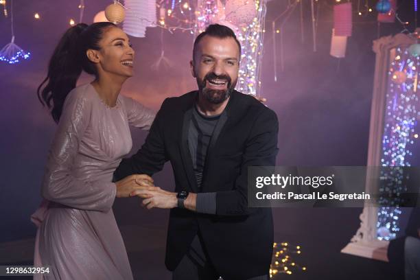 In this image released on January 26th, model Sheherazade Darkhlaoui and designer Julien Fournie pose during the Julien Fournie Haute Couture...