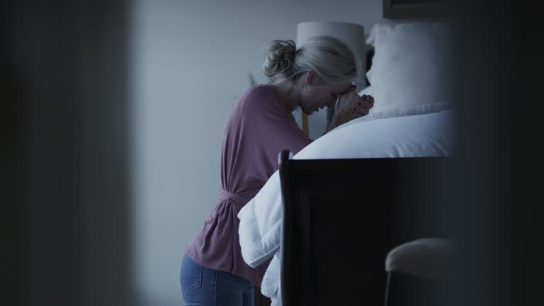 Praying Motion 990 Woman Praying At Night Stock Videos, Footage, & 4K Video Clips ...