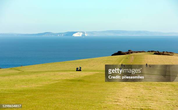 view from ballard down towards the isle of wight, isle of purbeck, england - the solent stock pictures, royalty-free photos & images