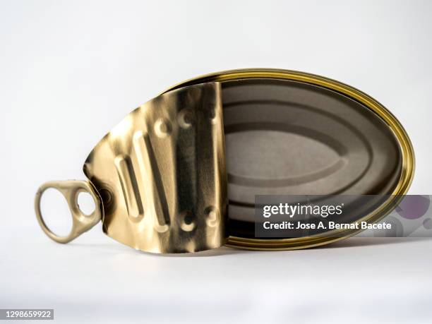 close-up of open tin can on a white background. - estaño fotografías e imágenes de stock