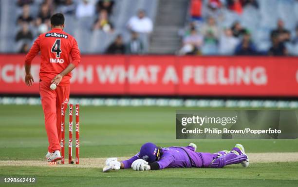 Imad Wasim of Renegades walks away after running out Peter Handscomb of Hurricanes during the Big Bash League match between the Melbourne Renegades...