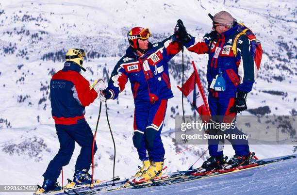 Daron Rahlves of USA high fives with coaches while checking the coarse for the Men's Downhill at the World Ski Championship on February 08, 1997 in...