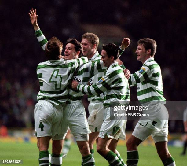 Phil O'Donnell is congratulated by Jackie McNamara , Morten Wieghorst, Paul Lambert and Marc Rieper after scoring for Celtic.