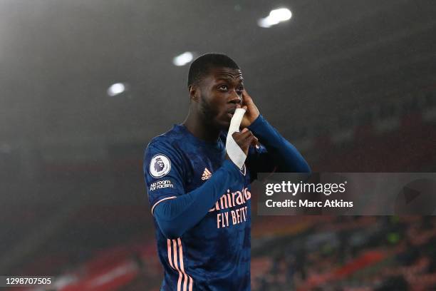 Nicolas Pepe of Arsenal celebrates after scoring his team's first goal during the Premier League match between Southampton and Arsenal at St Mary's...