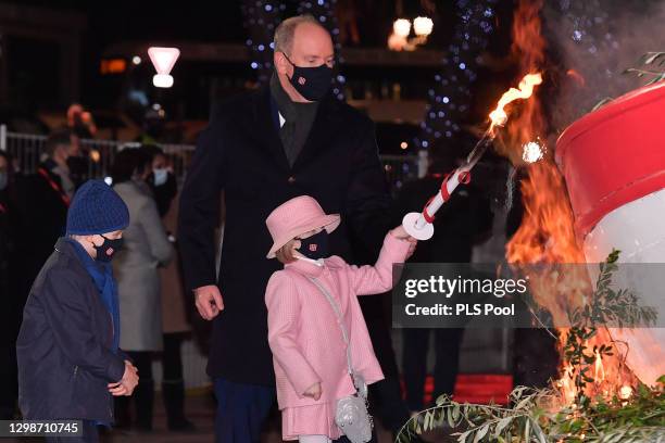 Prince Albert II of Monaco, Prince Jacques of Monaco and Princess Gabriella of Monaco attend the ceremony of Sainte-Devote on January 26, 2021 in...