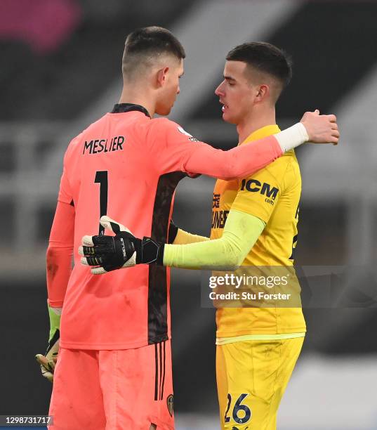 The two goalkeepers embrace after the game, Illan Meslier of Leeds and Karl Darlow during the Premier League match between Newcastle United and Leeds...