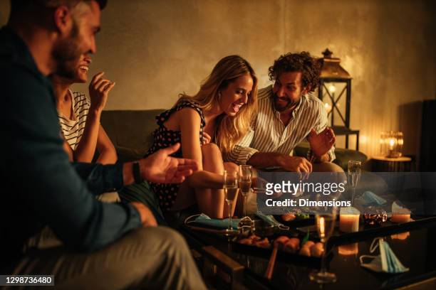 friends having a good time at dinner - evening meal restaurant stock pictures, royalty-free photos & images
