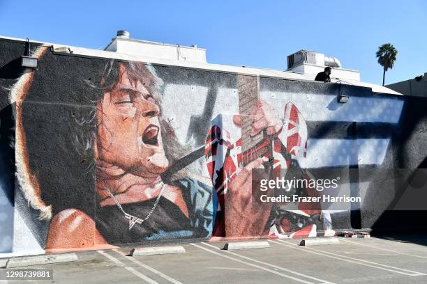 The Eddie Van Halen mural "Long Live The King" by artist Robert Vargas is unveiled at Guitar Center on January 26, 2021 in Hollywood, California.