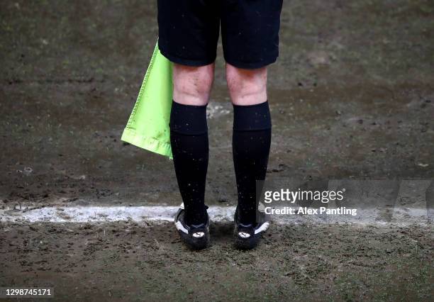 Detailed view of the lines official on the muddy touchline during the Sky Bet League One match between Peterborough United and Bristol Rovers at...