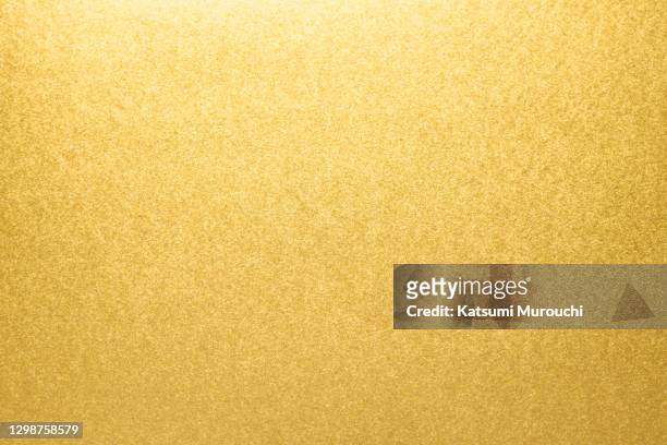 gold glitter texture background - material ストックフォトと画像