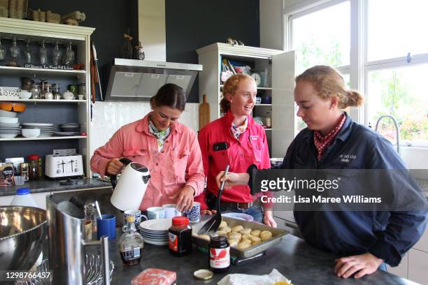 Maddie Stiller, Bonnie Penfold and Molly Penfold enjoy a morning break of freshly made scones and tea at 'Old Bombine' on January 18, 2021 in...