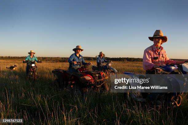 Sisters Bonnie, Molly, Jemima and Matilda Penfold take a late afternoon ride through an open paddock at Old Bombine on January 19, 2021 in Meandarra,...