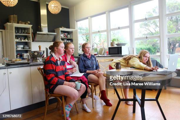 Sister Jemima, Bonnie, Molly and Matilda Penfold conduct a business zoom-call at 'Old Bombine' on January 18, 2021 in Meandarra, Australia. COVID-19...
