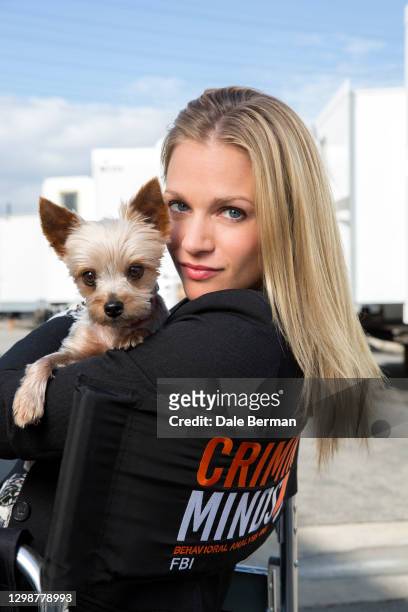 Actress A.J Cook poses for a portrait with her dog Zara on the Criminal Minds set in Los Angeles,CA on .