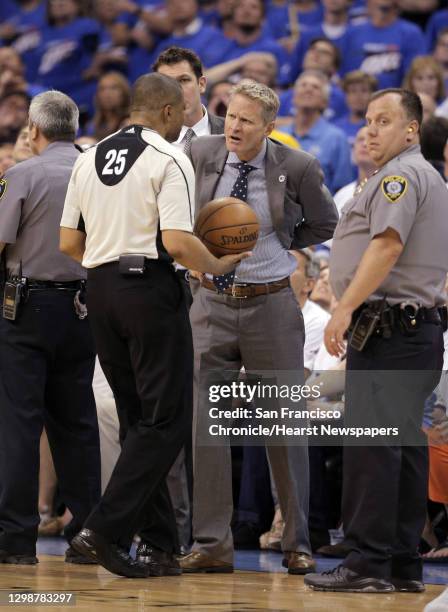 Steve Kerr questions referee Tony Brothers about a review for Draymond Green being assessed a technical foul for kicking Steven Adams in the groin...