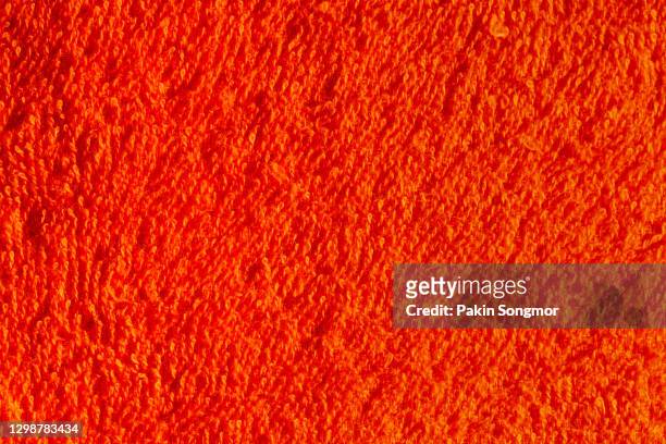 close up red towel texture, textile background. - carbon fiber texture stockfoto's en -beelden