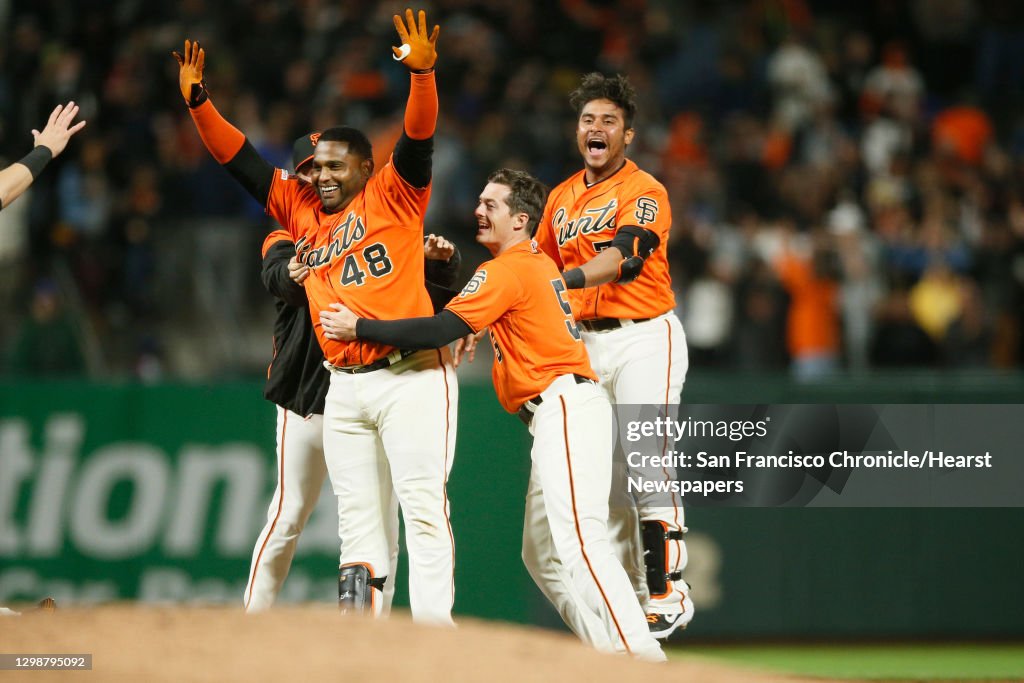 San Francisco Giants third baseman Pablo Sandoval (48) celebrates in the 10th inning of an MLB game at Oracle Park, Friday, July 19, 2019, in San Francisco, Calif. Sandoval reaches on a fielding error by New York Mets Dominic Smith (22). San Francisco Gia