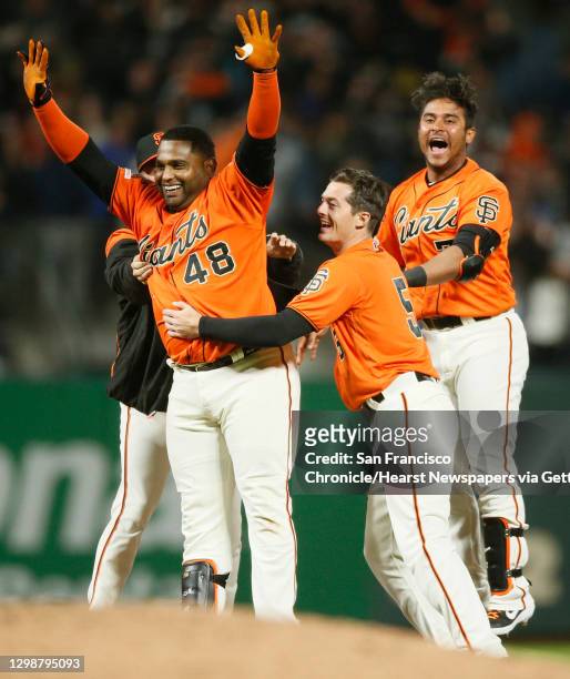 San Francisco Giants third baseman Pablo Sandoval celebrates in the 10th inning of an MLB game at Oracle Park, Friday, July 19 in San Francisco,...