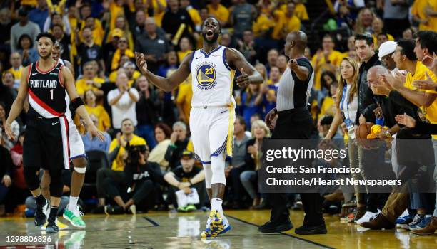 Golden State Warriors Draymond Green reacts in the fourth quarter during game 1 of the Western Conference Finals between the Golden State Warriors...