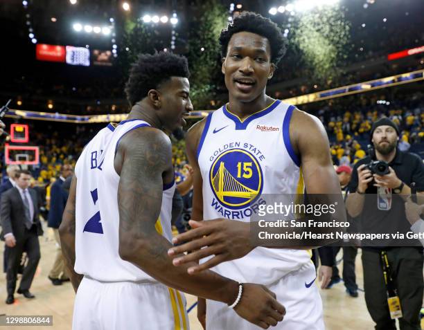 Golden State Warriors' Damian Jones and Jordan Bell after Warriors' 116-94 win over Portland Trail Blazers in Game 1 of NBA Western Conference Finals...