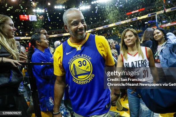 Dell, Sonya and Ayesha Curry leave the floor after game 1 of the Western Conference Finals between the Golden State Warriors and the Portland Trail...