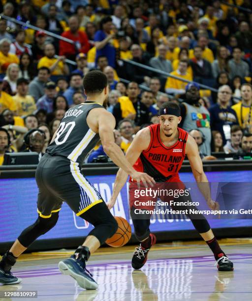 Golden State Warriors� Stephen Curry guards Portland Trail Blazers� Seth Curry in the second quarter during game 2 of the Western Conference Finals...