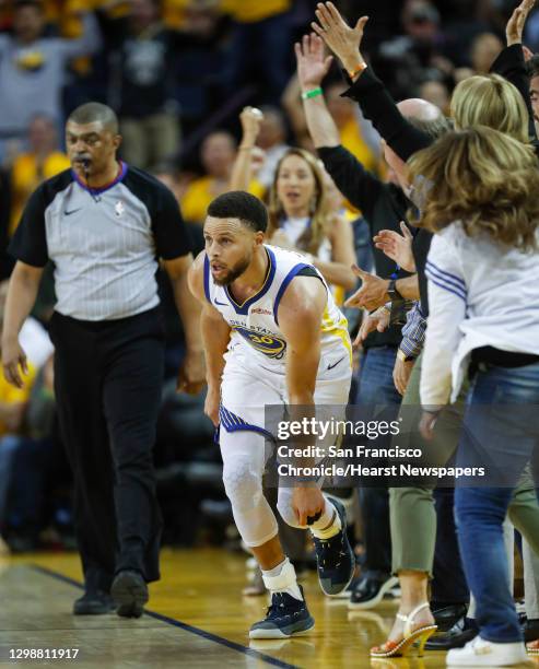 Golden State Warriors� Stephen Curry gets up after sliding into fans in the second quarter during game 1 of the Western Conference Finals between the...