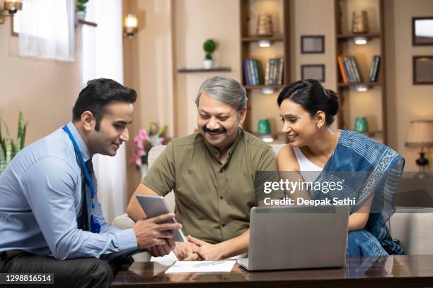 sales executive - stock photo - india economy business and finance stock pictures, royalty-free photos & images