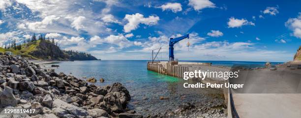 cargo jetty at cascade bay, norfolk island, australia - norfolk island stock pictures, royalty-free photos & images