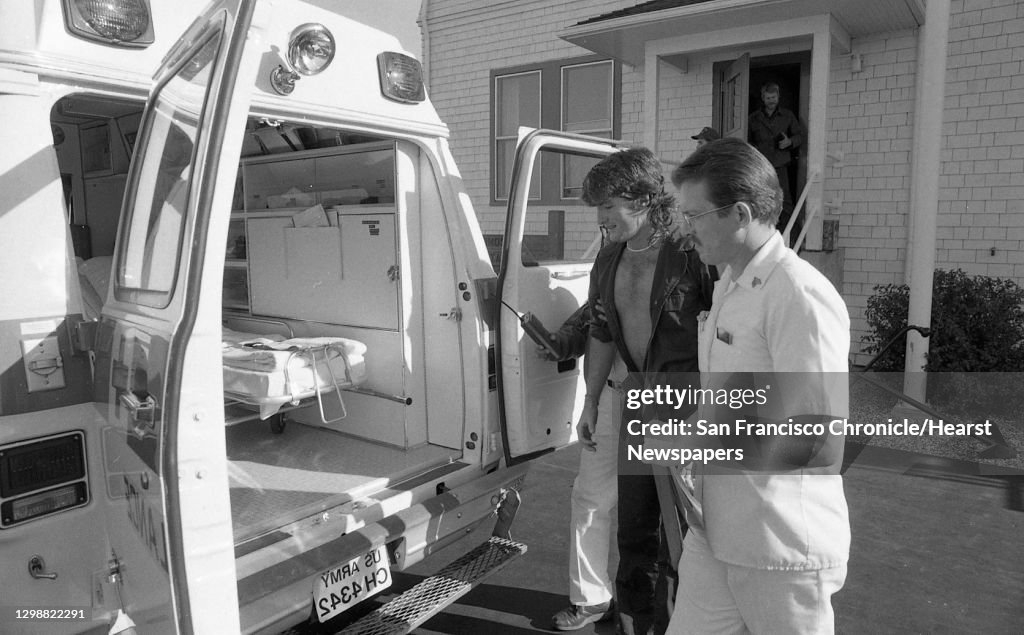 Stunt man Steve Trotter being sent to the hospital to be checked out after lowering himself down to the water by rope from the Golden gate Bridge. . He got stuck about seventy feet from the water and had to drop himself in. November 13, 1985