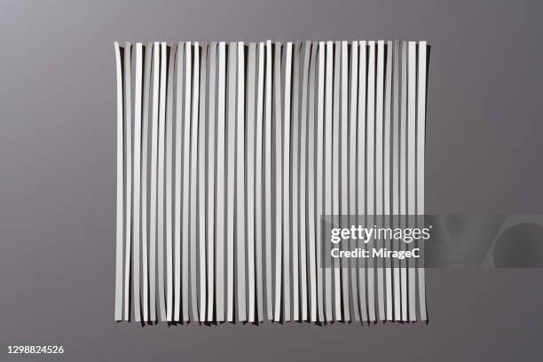 neatly spliced shredded paper - lanière objet manufacturé photos et images de collection