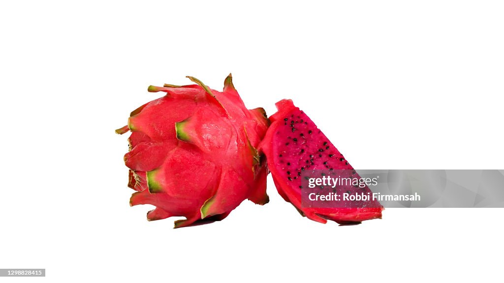 A Dragon Fruit and Slice Of Dragon Fruit On The White Background