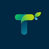 T letter green gradient eco logo.