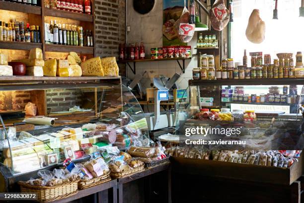 gourmet merchandise in argentine specialty store - delicatessen stock pictures, royalty-free photos & images