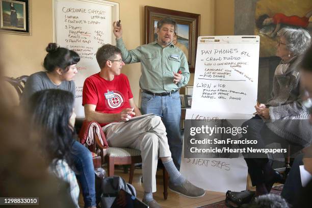Left to right-- April Newman, Karina Perez, Kent Moriarty, Rodrigo Torres and Ann Smock coordinate how to continue support for immigrants in jail at...