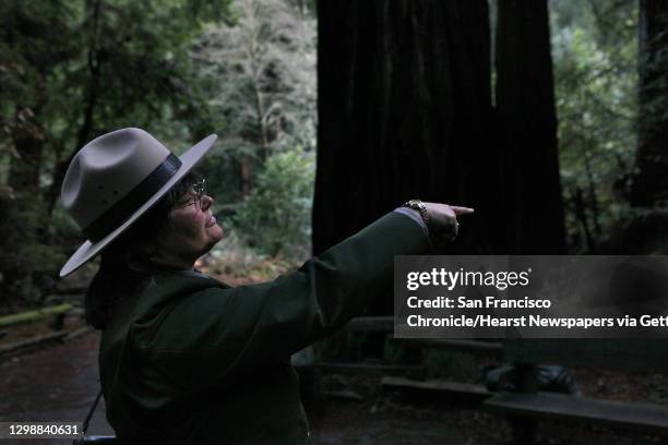 Ranger Alexandra Picavet from the Golden Gate national park service points out updated features at Muir Woods in Mill Valley, Calif., on Wednesday,...