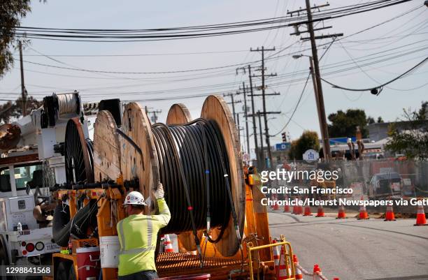 Huge spools of power cable is prepared to be installed as P.G. & E. Runs power lines underground along Old County Rd. Near Harbor Boulevard, with...
